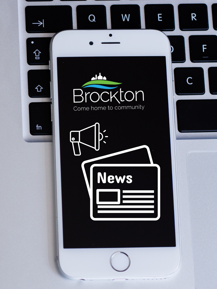 Laptop and cellphone with Brockton logo and news icon