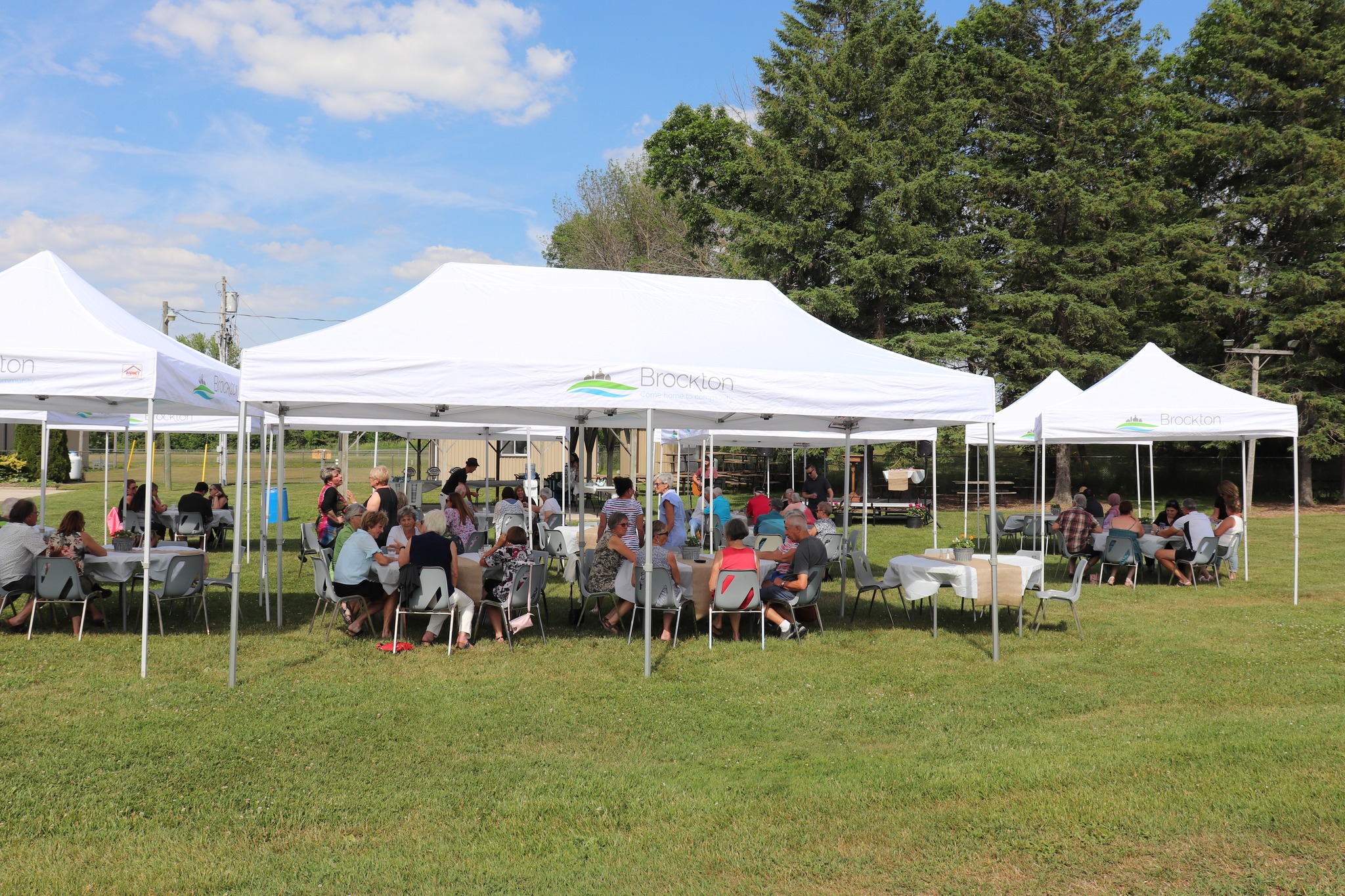 Volunteer Recognition with People in Tents.jpg